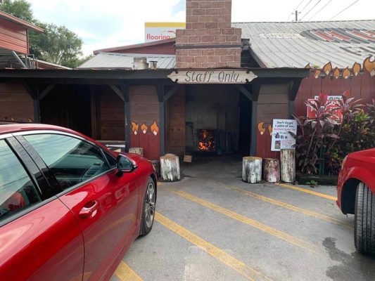 Hungry Harrys Land O'Lakes staff area smokehouse